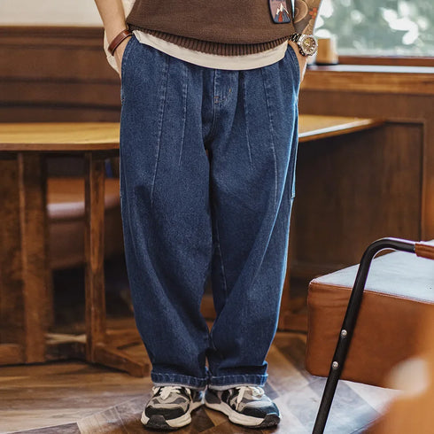 Premium retro washed logging jeans with loose fit, elastic waist, and vintage style.